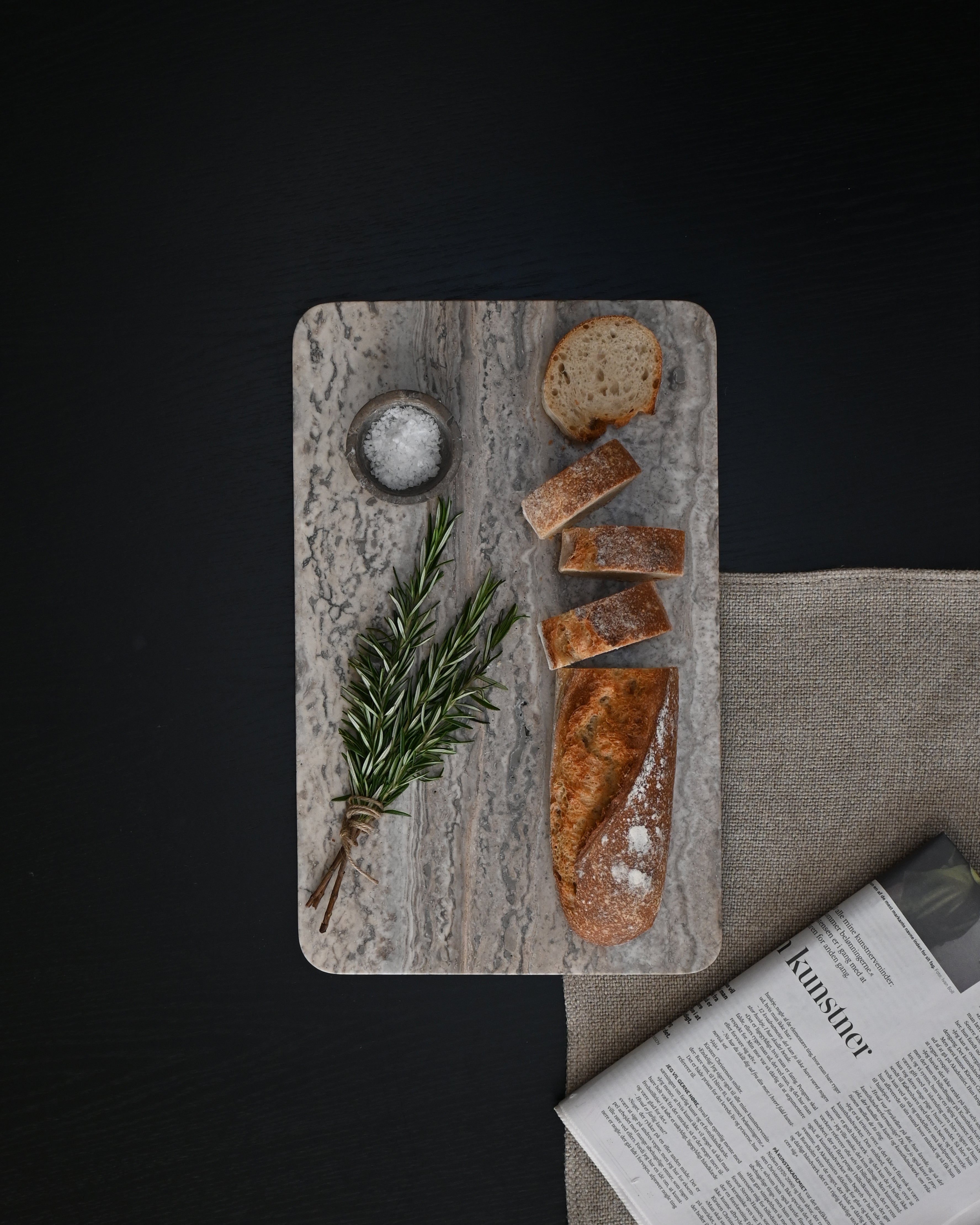 Enkei Tray Rectangular, Medio styled on a dining table – Silver Travertine (Earth), 101 Copenhagen.