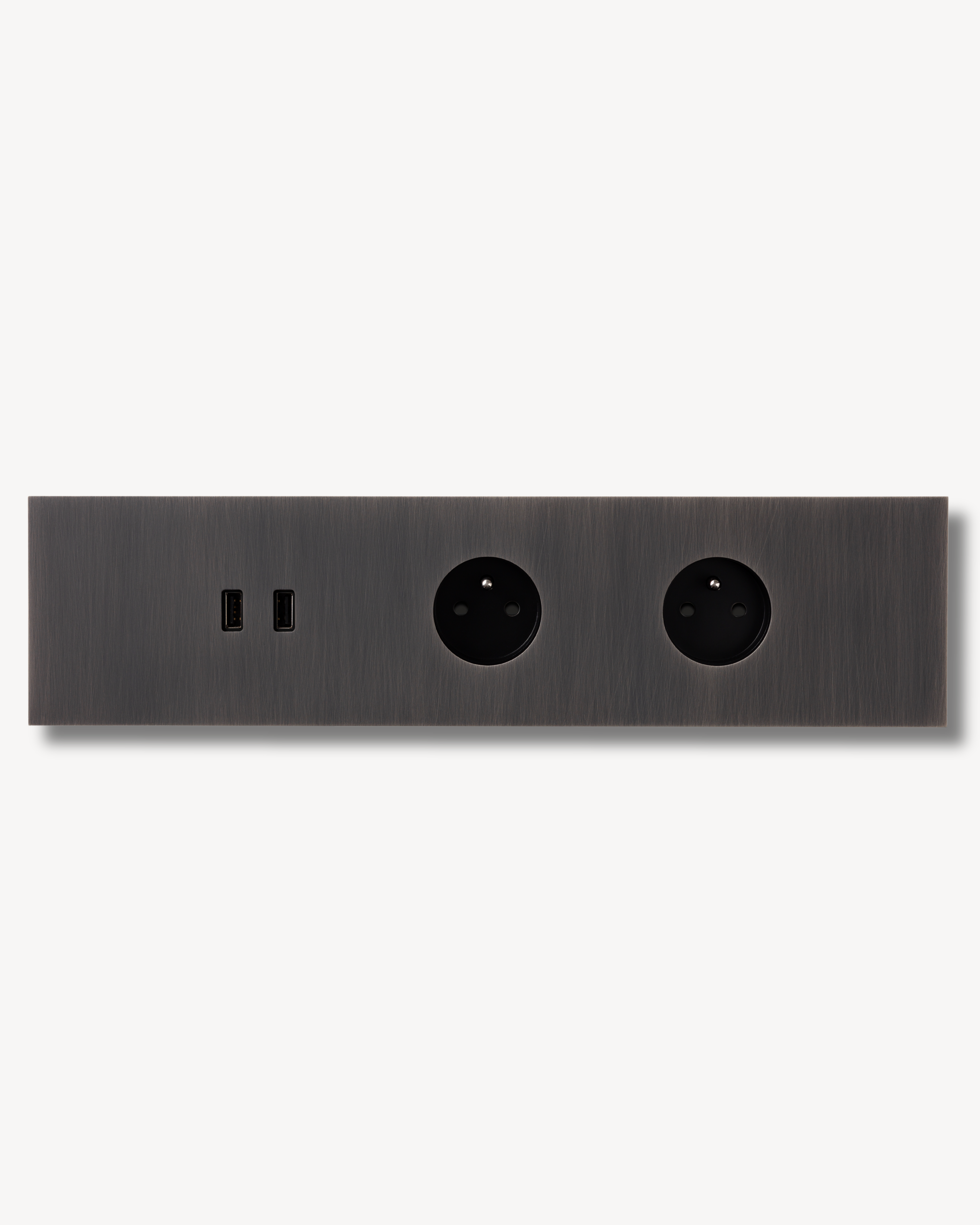 Dark canon de fusil finished brass electrical switch plate out of 5 units. Two units are empty while one is double USB ports and two of them are european outlets.
