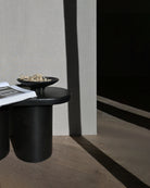 Sculptural Medusa Tray Mini on a tabletop in Coffee brown – 101 Copenhagen.