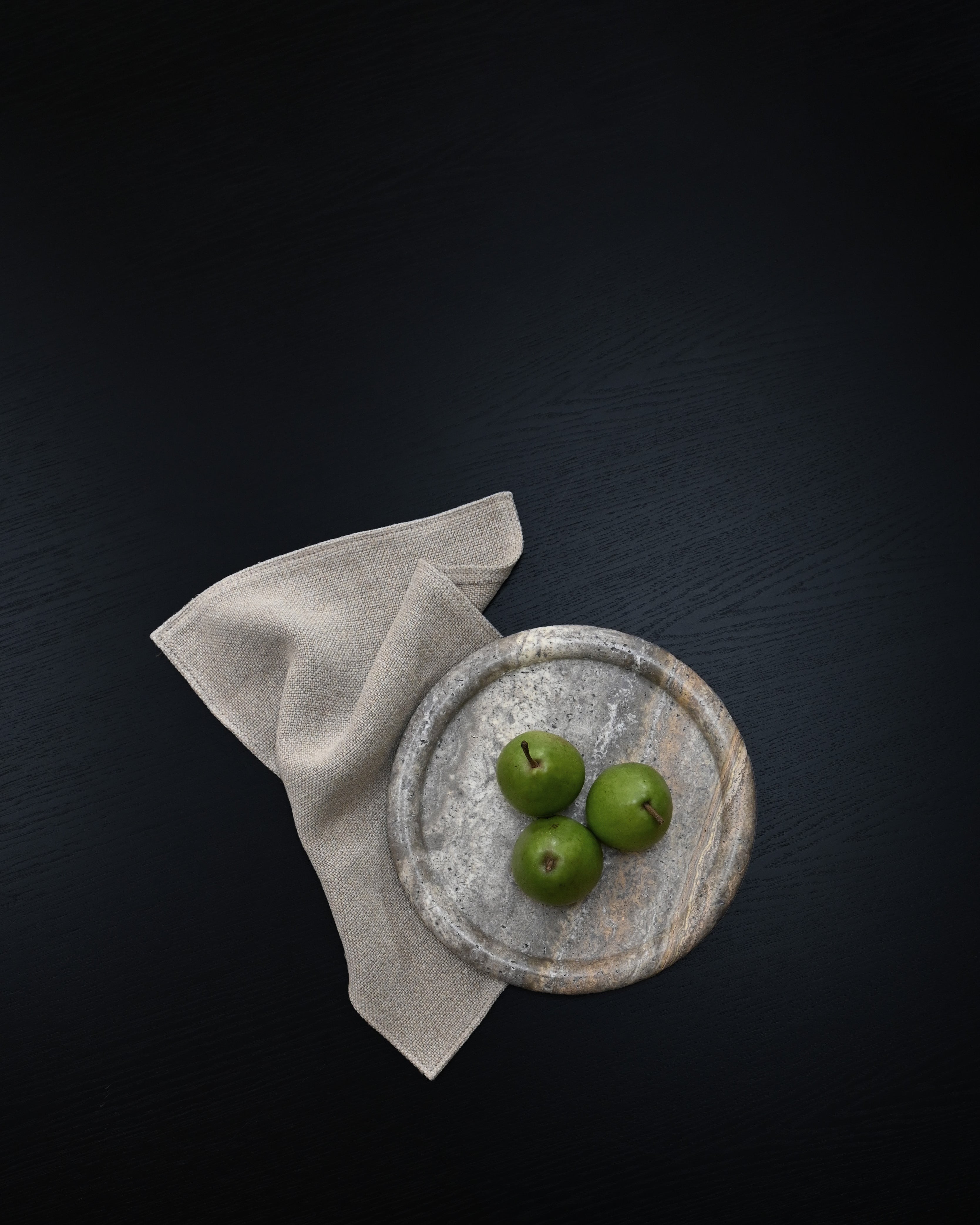 Round serving and styling tray, Enkei Tray, Medio in Earth travertine – 101 Copenhagen.