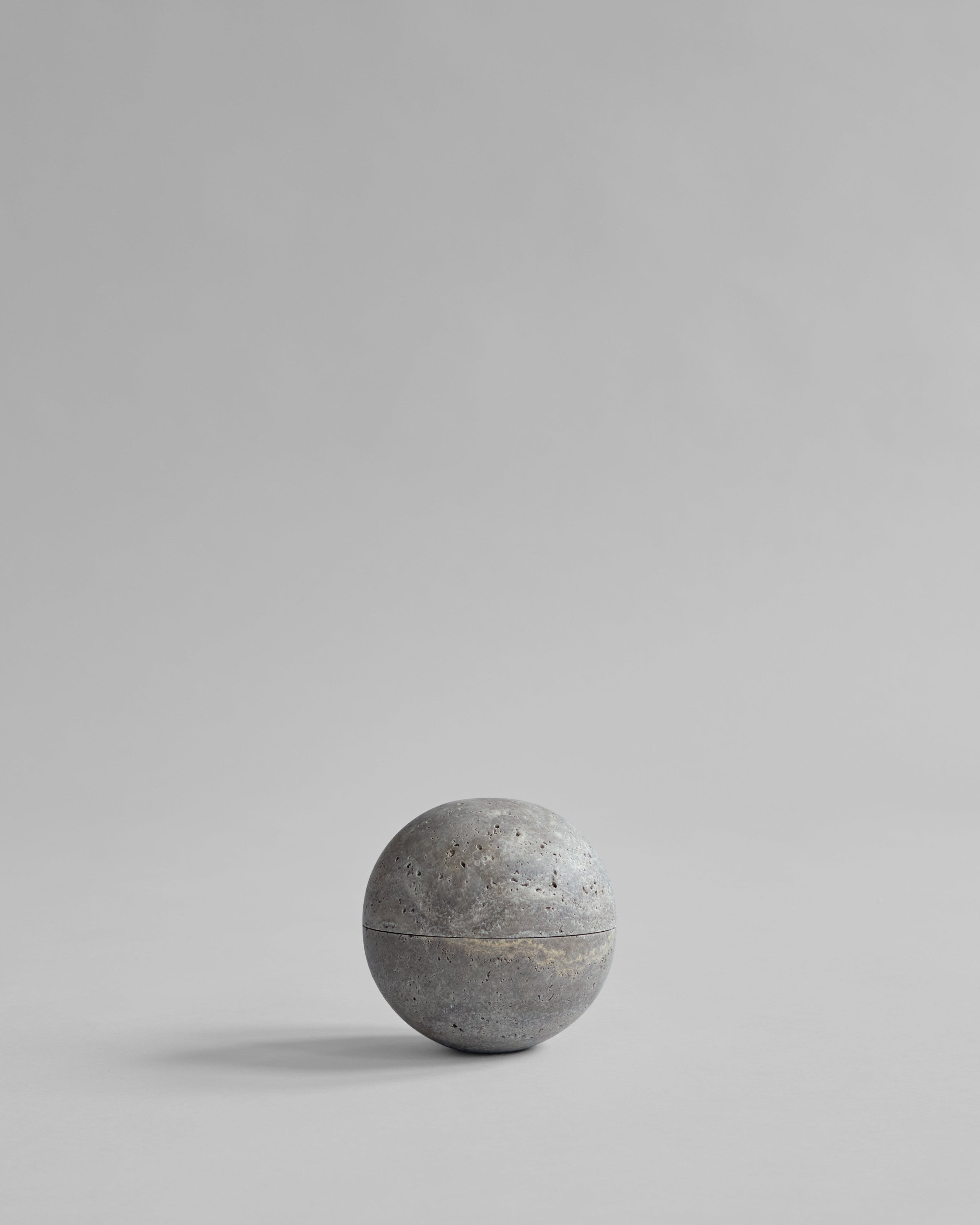 Concrete ball on a gray background