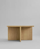 Oak coffee table on a light gray background. Brutus Coffee Table by 101 Copenhagen curated by Numa Home