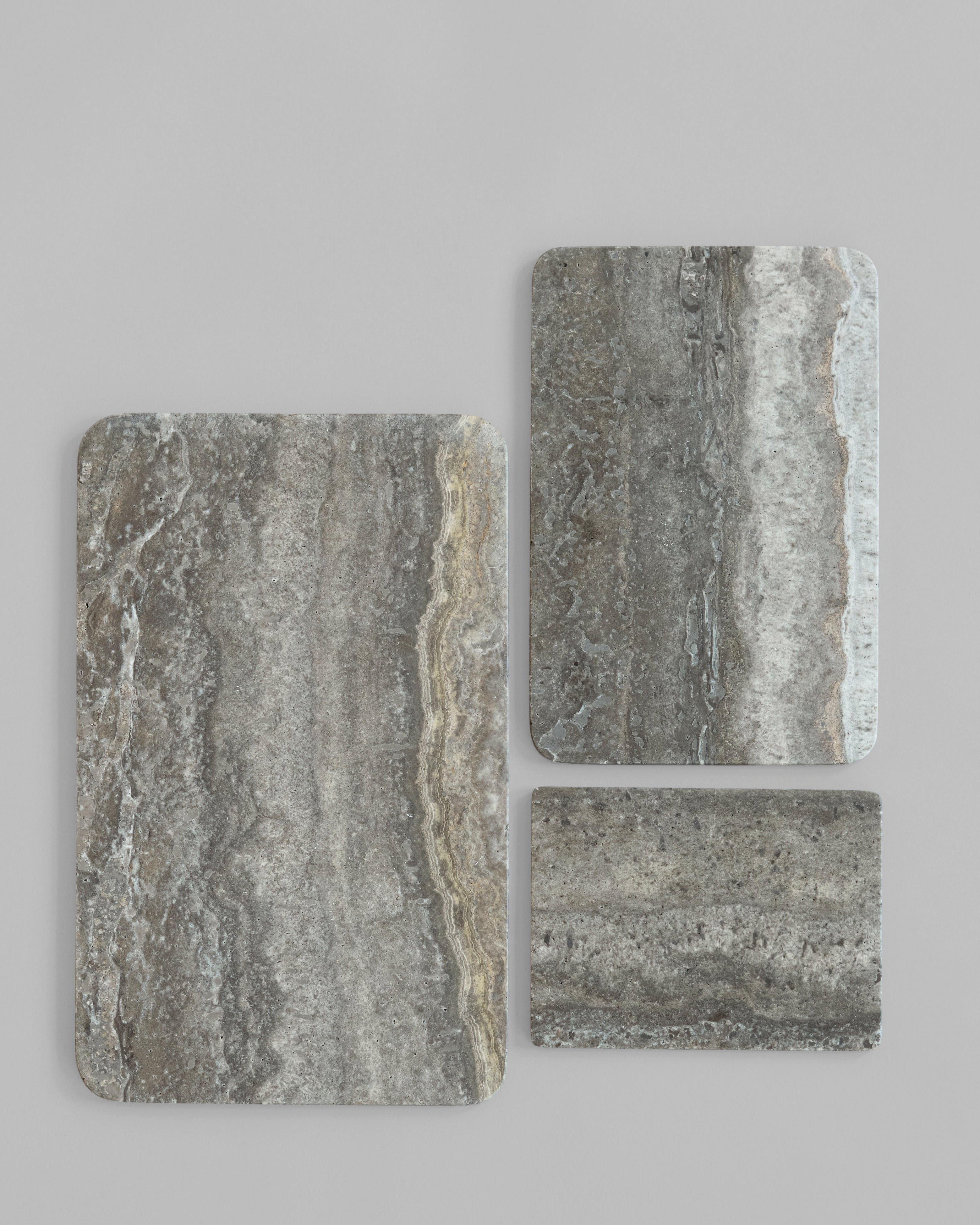Enkei Tray Rectangular, Petit, Mini and Medio side by side to compare sizes in Silver Travertine (Earth) – 101 Copenhagen.