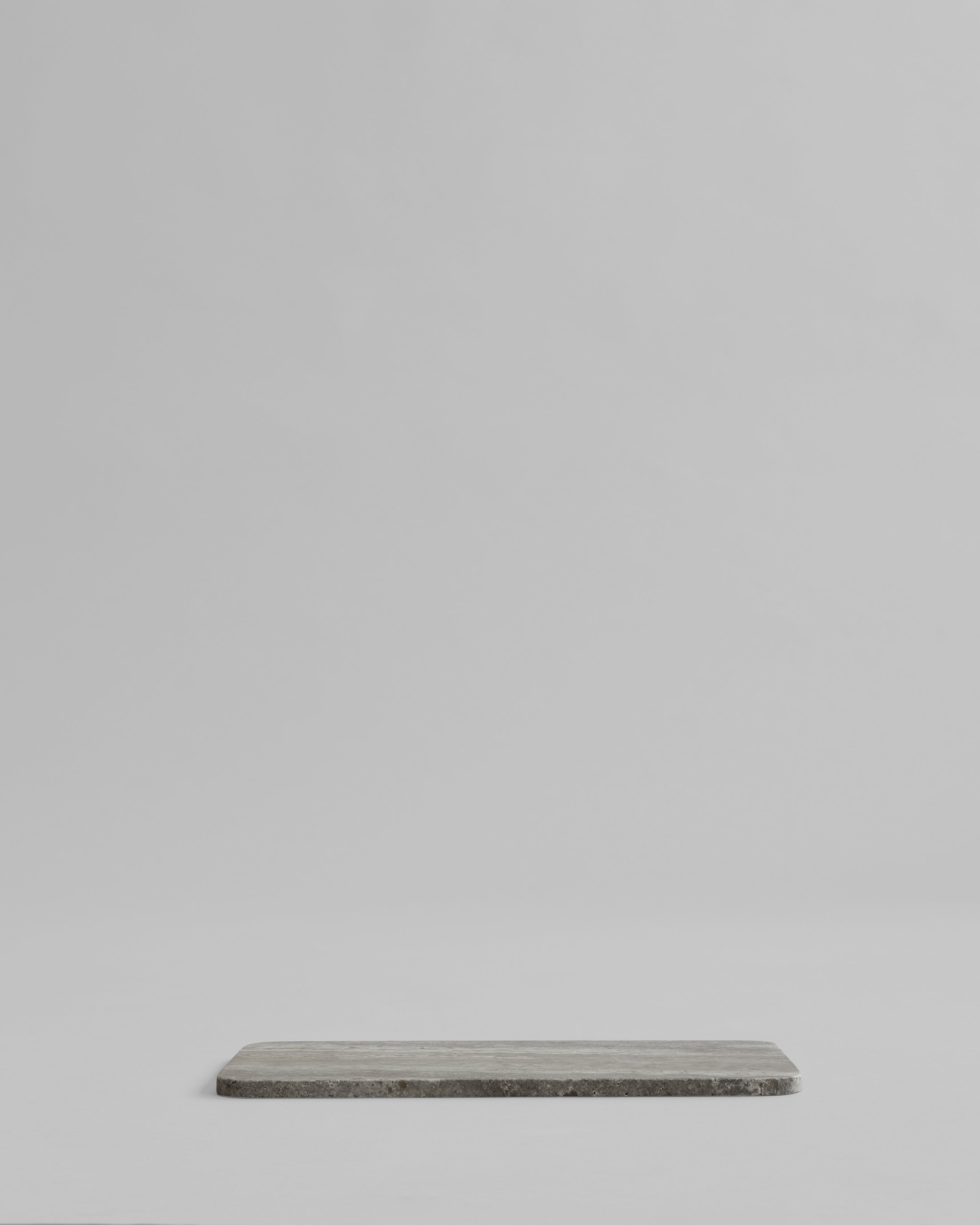 Side view showing slim profile of Enkei Tray Rectangular, Mini – Silver Travertine, 101 Copenhagen.