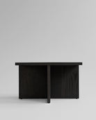 Black oak coffee table on a light gray background. Brutus coffee table by 101 Copenhagen, curated by Numa Home.