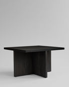 Black oak coffee table on a light gray background. Brutus coffee table by 101 Copenhagen, curated by Numa Home.