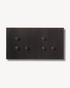Double brass switch with 6 buttons created by Sumum curated by Numa Home
