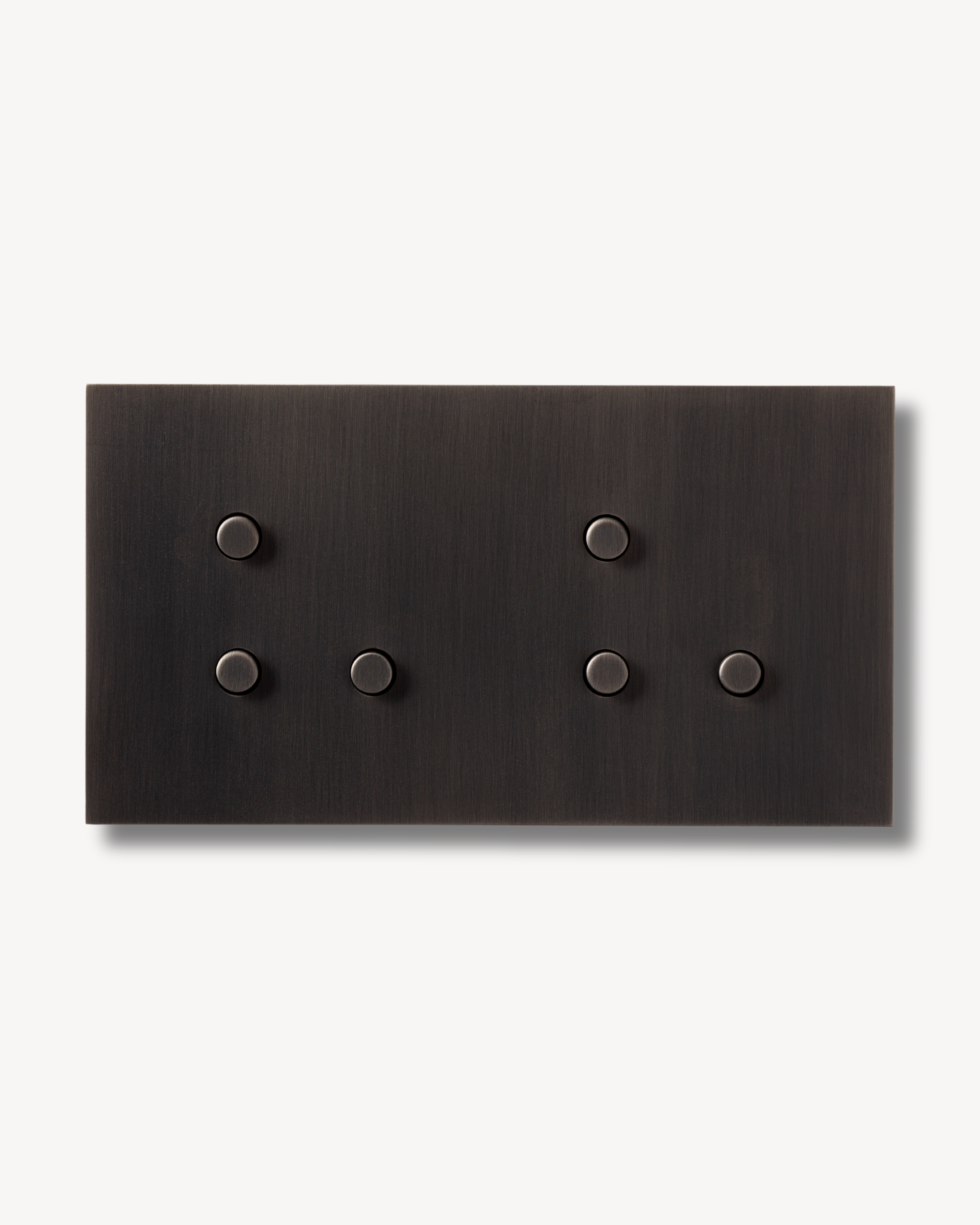 Double brass switch with 6 buttons created by Sumum curated by Numa Home